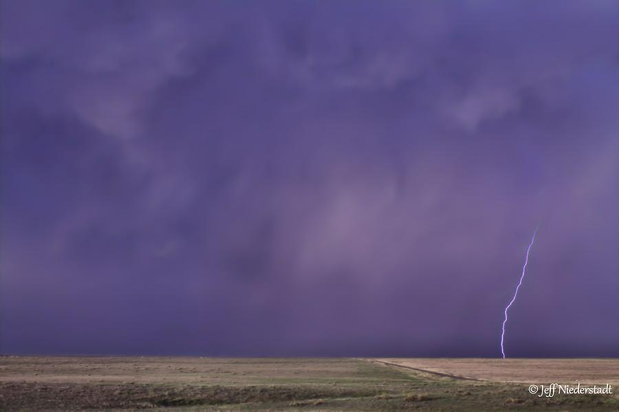 Rain bolt Photograph by Jeff Niederstadt