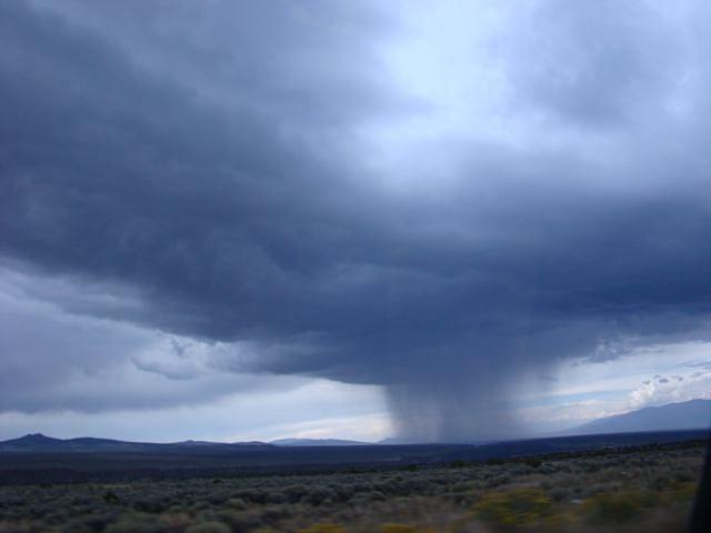 Rain Cloud In The Desert Photograph by Ghiri Obermann - Fine Art America