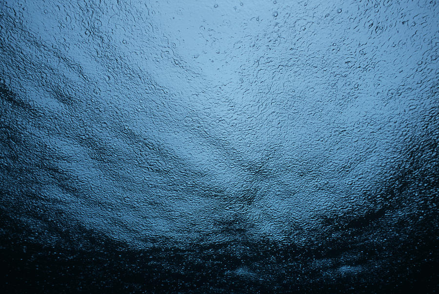 Rain On Ocean Surface Photograph by Jeff Rotman