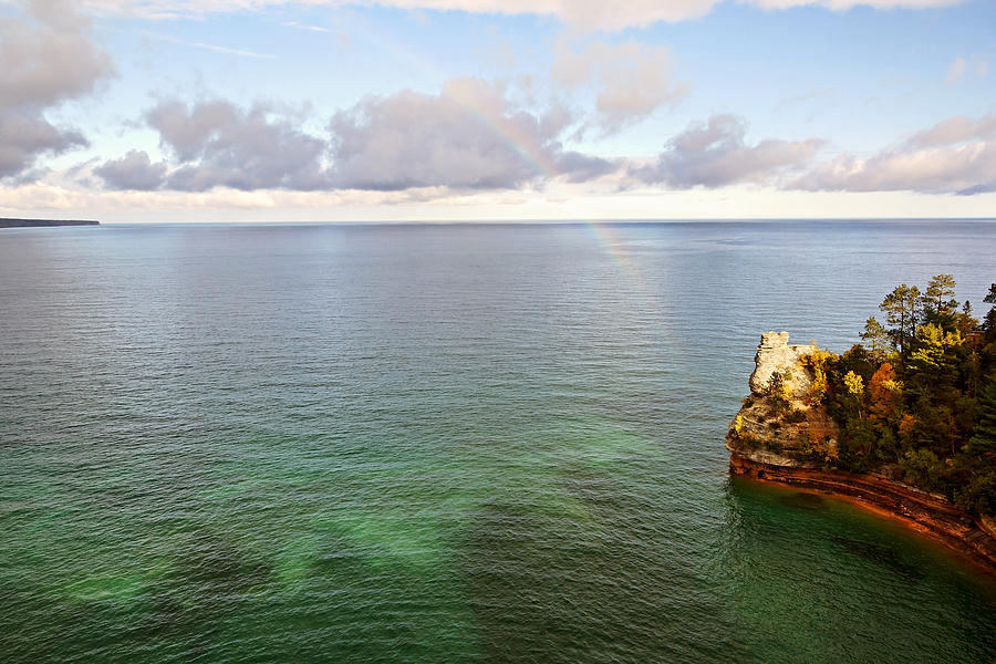 Rainbow at Miners Castle Rock Photograph by Theo OConnor