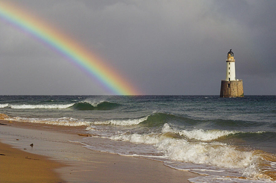 Rainbow Beside A Lighthouse Photograph by Duncan Shaw/science Photo Library
