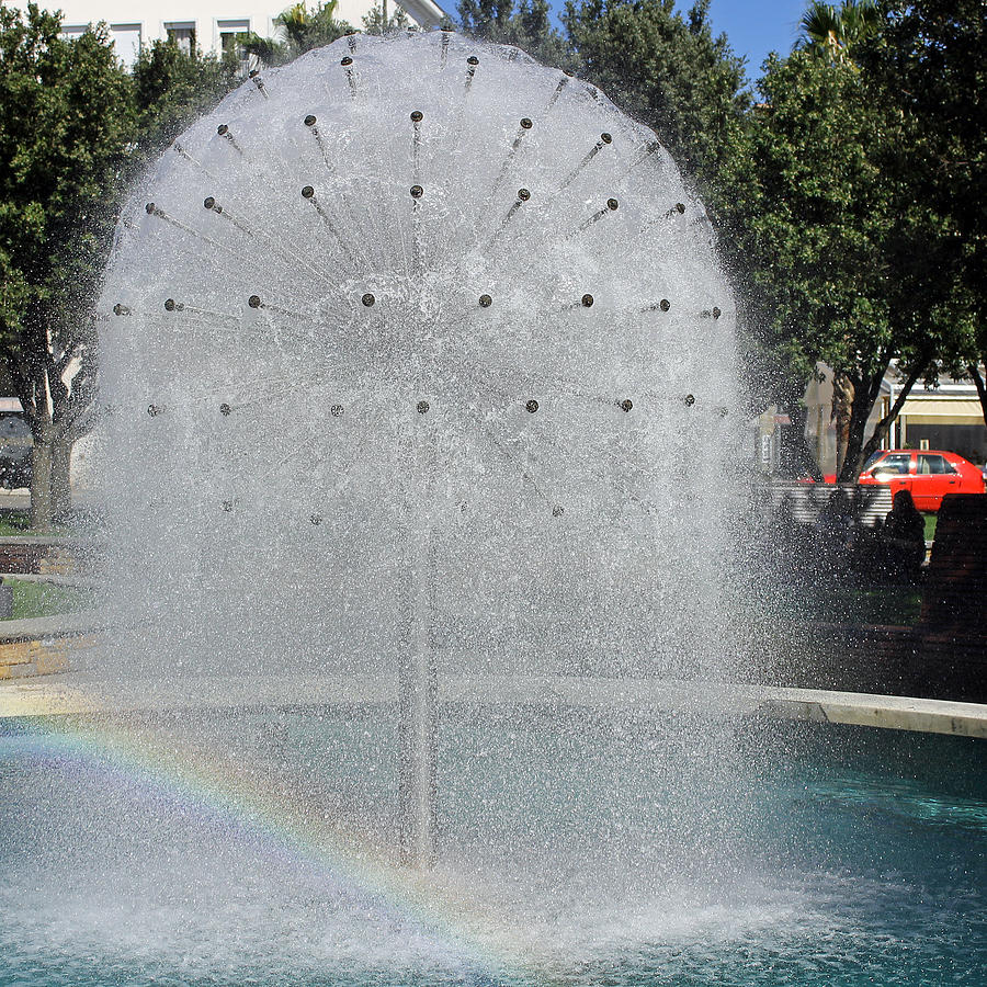 Rainbow in Fountain Photograph by Tony Murtagh