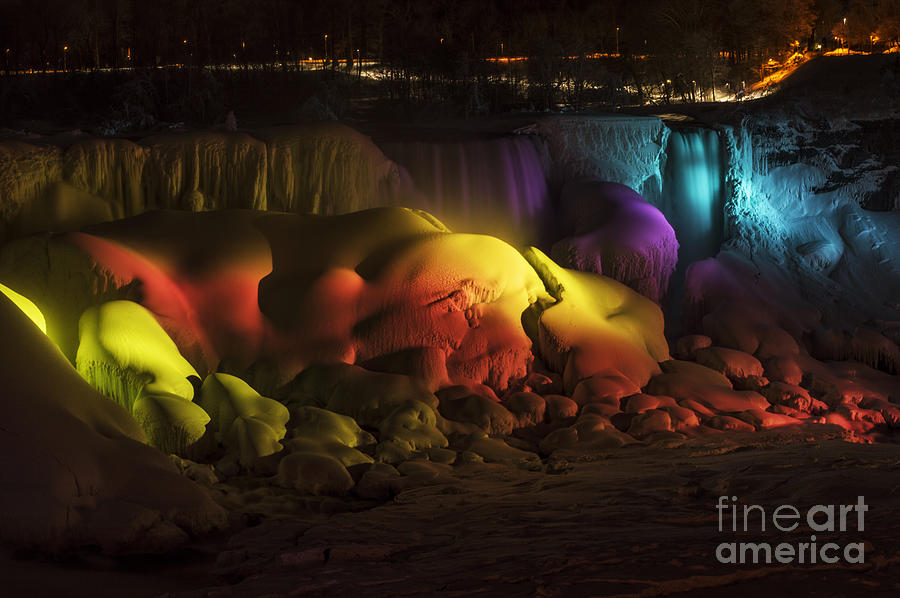 Rainbow Light on Frozen Falls Photograph by JT Lewis
