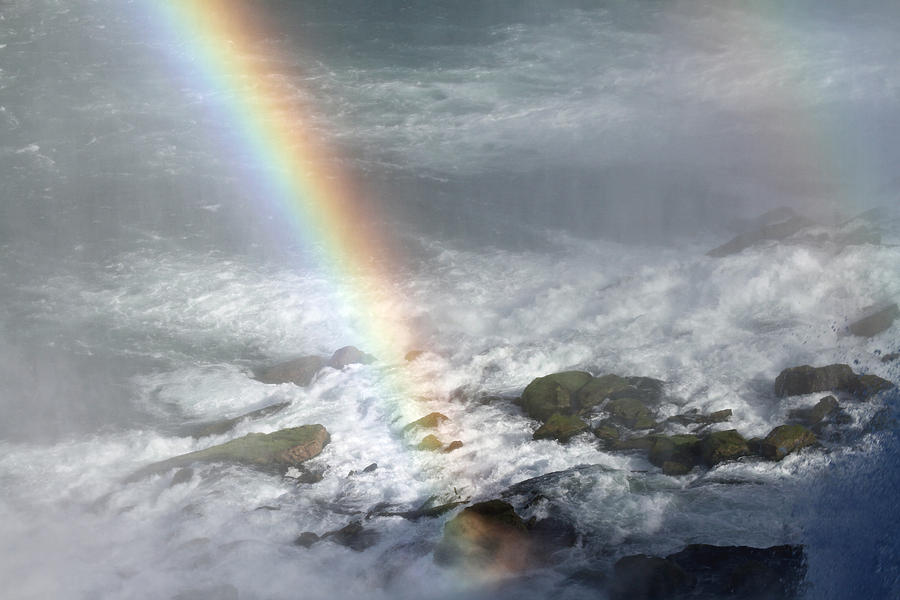 Rainbow on the Rocks Photograph by Jackson Pearson
