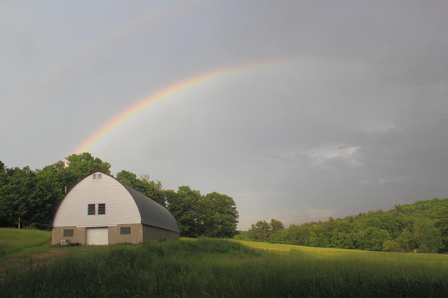Rainbow over Barn Photograph by John Burk