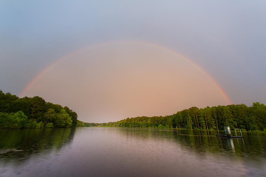 Rainbow over Hinson Photograph by Jimmy McDonald