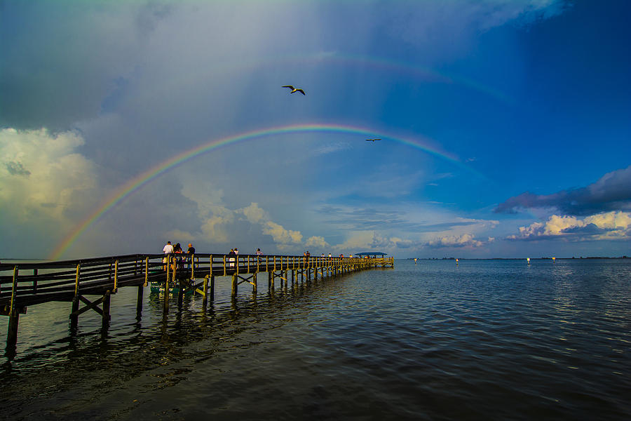 Rainbow Over Pier Photograph by Kevin Cable