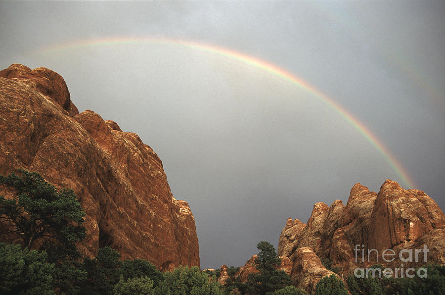 Rainbow over Sandstone Photograph by Liz Leyden
