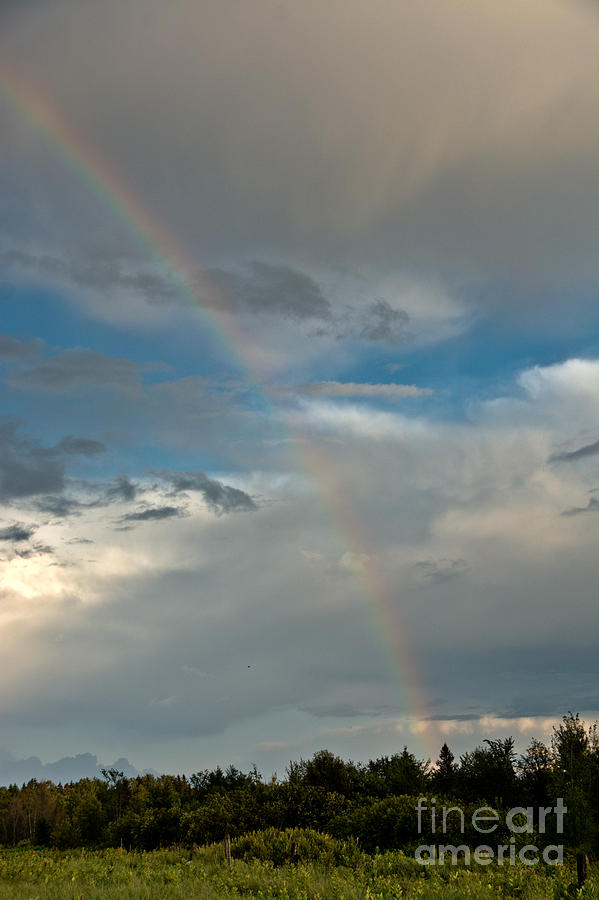 Rainbow through the clouds Photograph by Cheryl Baxter