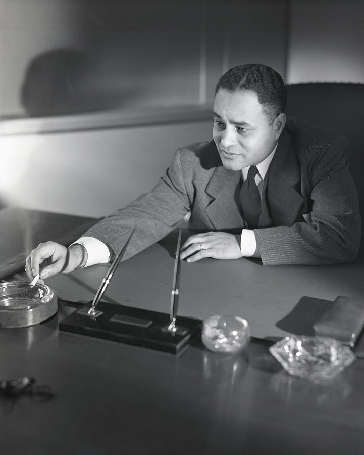 Ralph L. Bunche Smoking Photograph by Horst P. Horst