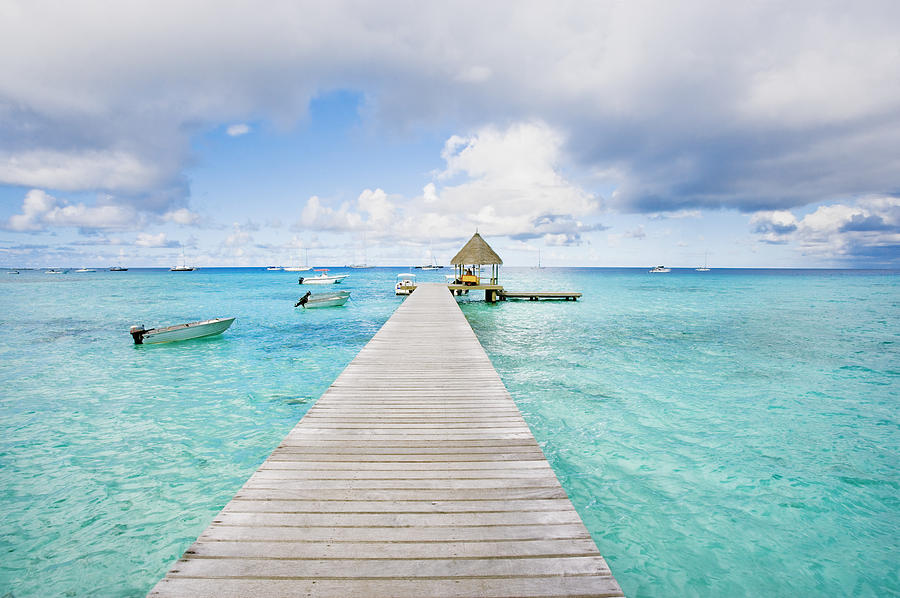 Rangiroa Atoll Pier on the ocean Photograph by M Swiet Productions