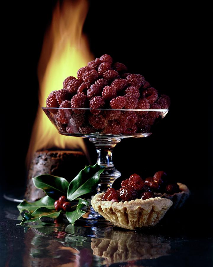 Raspberries In A Glass Serving Dish With Tarts Photograph by  Fotiades