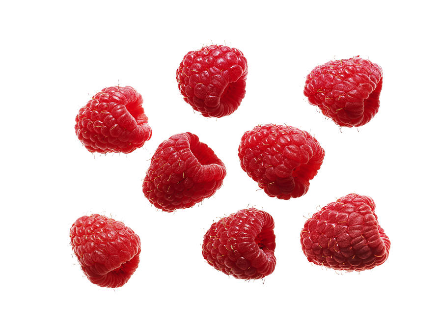 Raspberries on white background Photograph by Johner Images