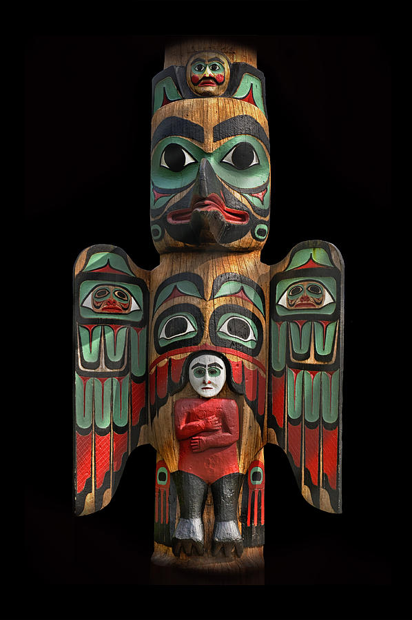 Raven and Saxman Totem Photograph by Gary Warnimont