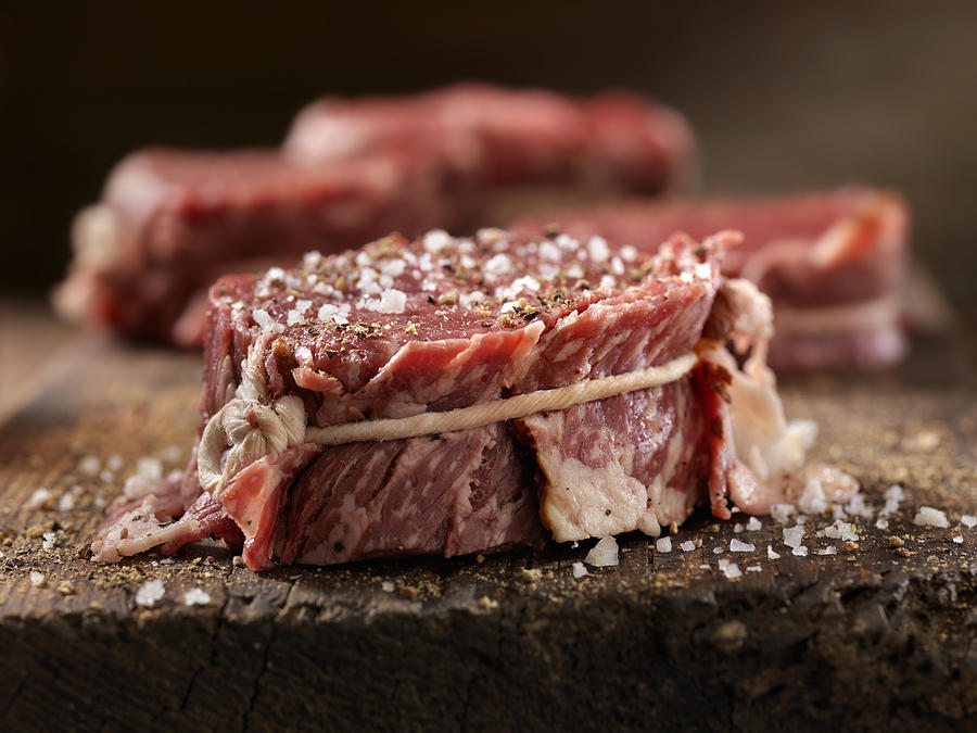 Raw Bacon Wrapped Steak Fillets Seasoned With Salt And Pepper Photograph by Lauri Patterson Raw Bacon Wrapped Steak Fillets Seasoned With Salt And Pepper Photograph by Lauri Patterson