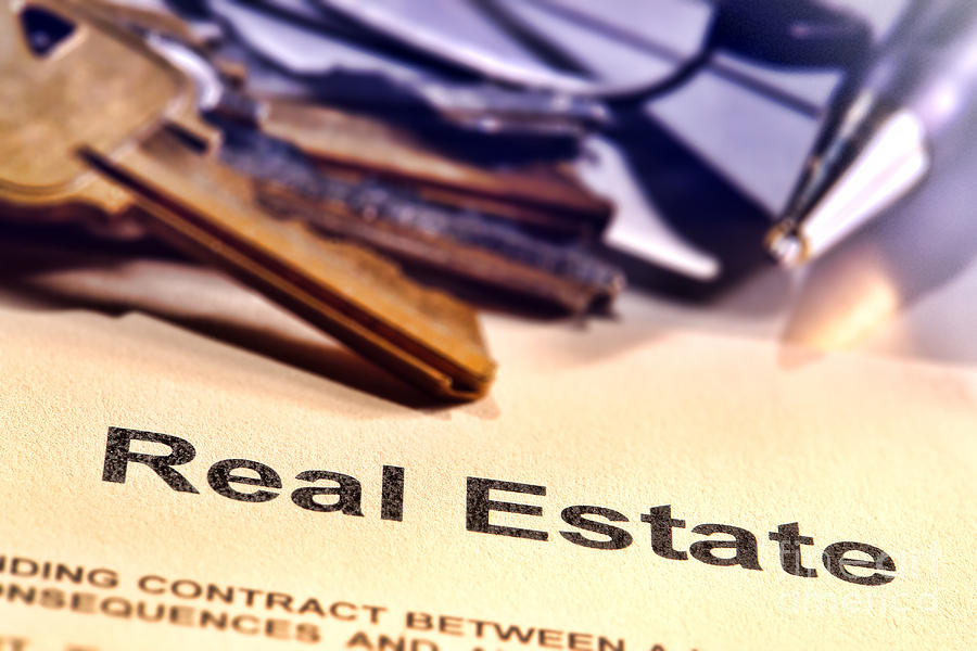 Real Estate Title Word on a Realtor Contract Page Photograph by Olivier Le Queinec