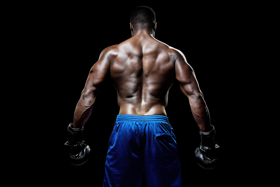 Rear view of muscular black male Photograph by Lorado