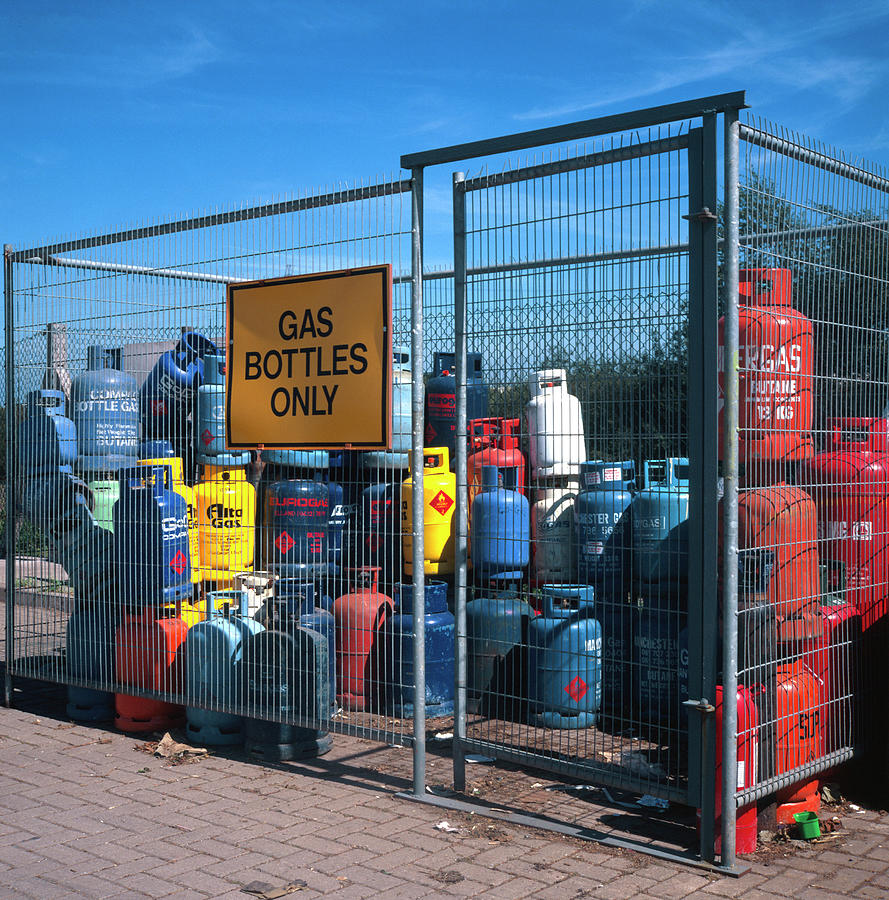 Recycling Point For Domestic Butane Gas Cylinders Photograph by Science