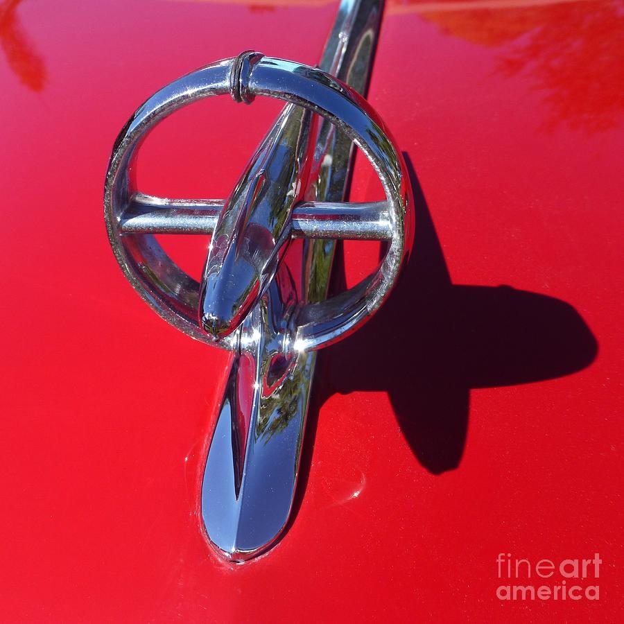Vintage Photograph - Red 48 Buick Eight Super Hood Ornament with Shadow by Barbie Corbett-Newmin