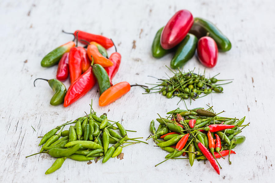 Red And Green Chili Peppers Photograph by Voisin/Phanie