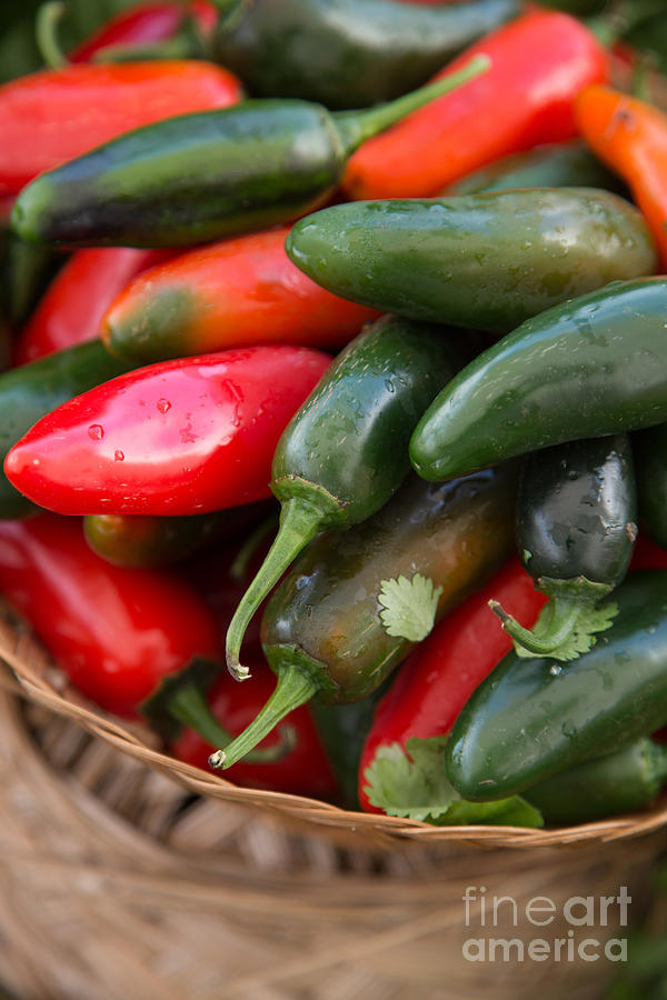Red and Green Chilis in basket Photograph by Rebecca Cozart