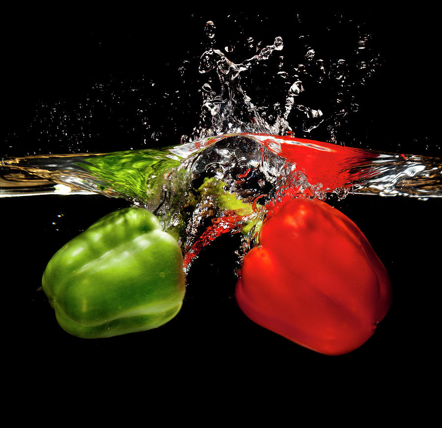 Red And Green Pepper Splash Photograph by Ian Moran
