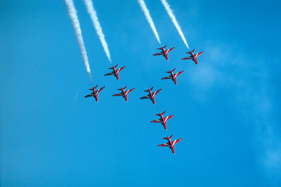 Red arrows airshow - aircrafts flying in formation Photograph by Matthias Hauser