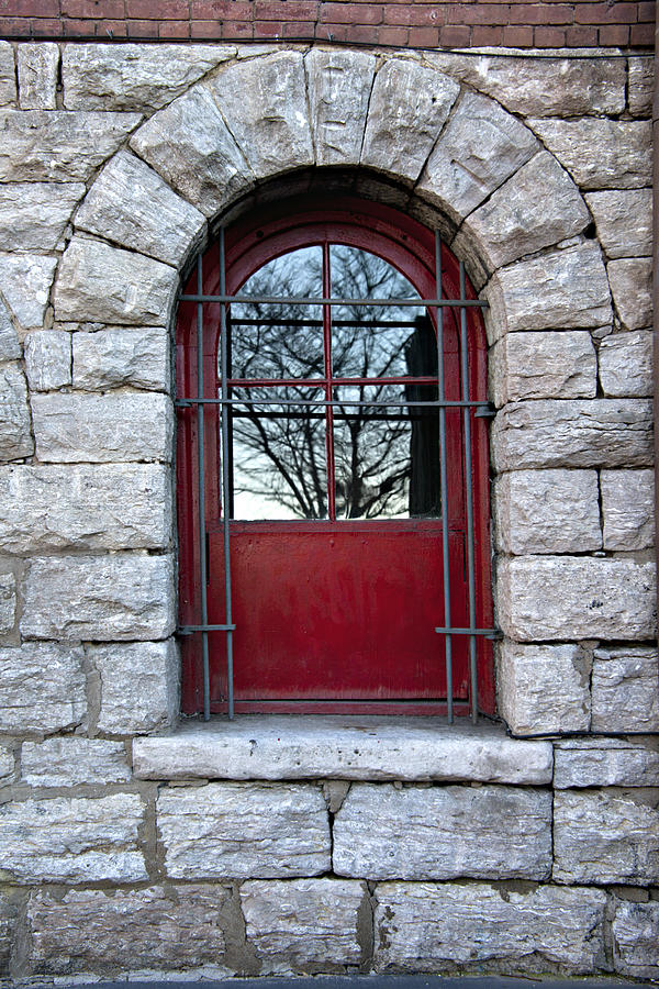 Architecture Photograph - Red barred window in stone wall by Heather Reeder