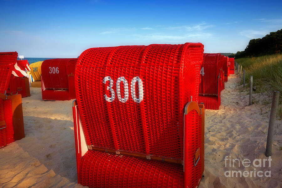 Red Beach Chairs In The Early Evening Light Photograph