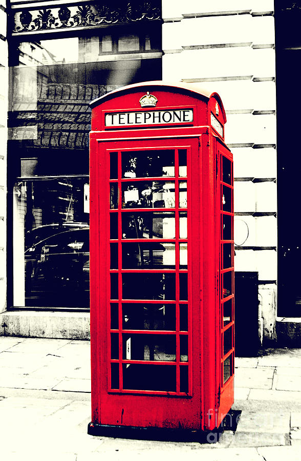 Black And White Photograph - Red British Telephone Booth by Joan McCool