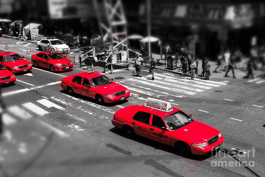 Red Cabs on Time Square Photograph by Hannes Cmarits