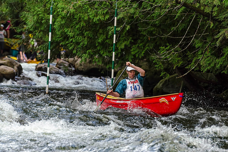 Red canoe below the slalom gate Photograph by Les Palenik