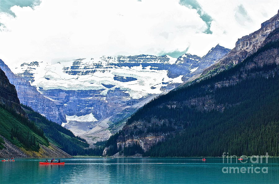 Red Canoes Turquoise Water Photograph by Linda Bianic