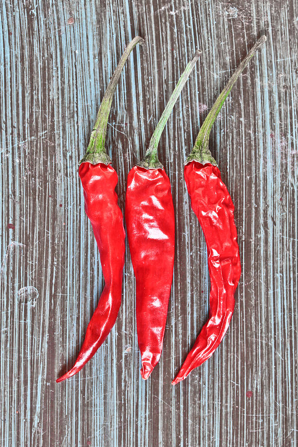 Red chilis Photograph by Tom Gowanlock