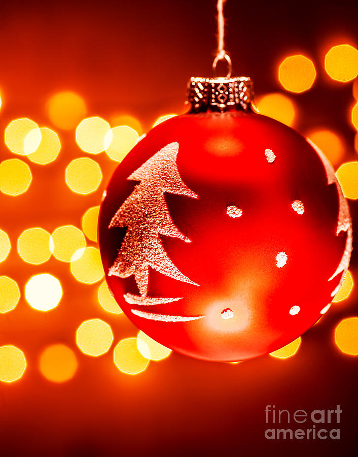 Red Christmas tree bauble Photograph by Anna Om