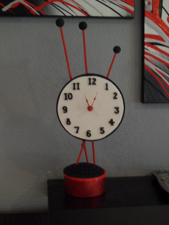 Red Clock Sculpture by Val Oconnor