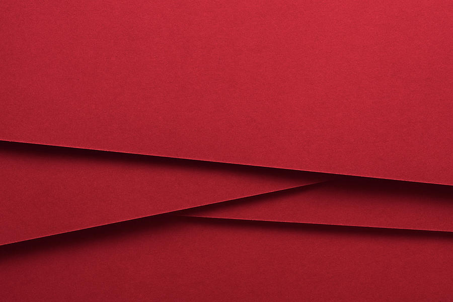 Red Colored Paper Crossing Photograph by Miragec
