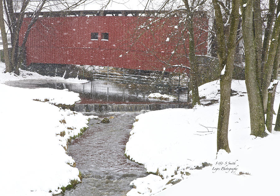 Red covered bridge in snow Photograph by Steve and Sharon Smith