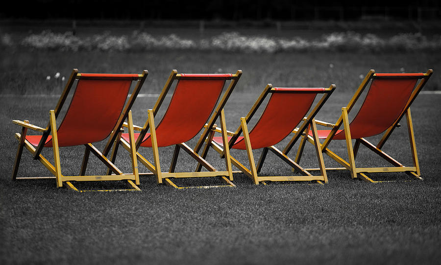 Landscape Photograph - Red deck chairs by Mikhail Pankov