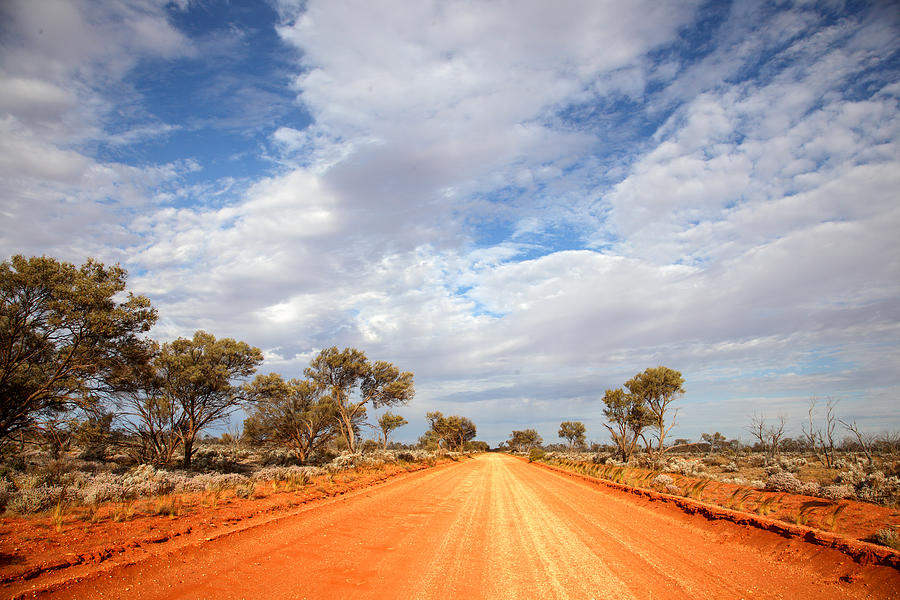 Red dirt road in outback Australia. Photograph by John White Photos