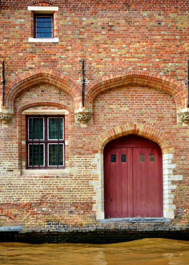 Red doors in Bruge Photograph by Matt MacMillan