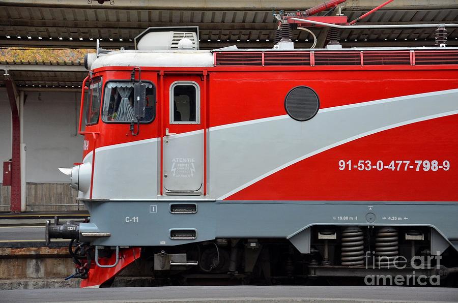 Red electric train locomotive Bucharest Romania Photograph by Imran Ahmed