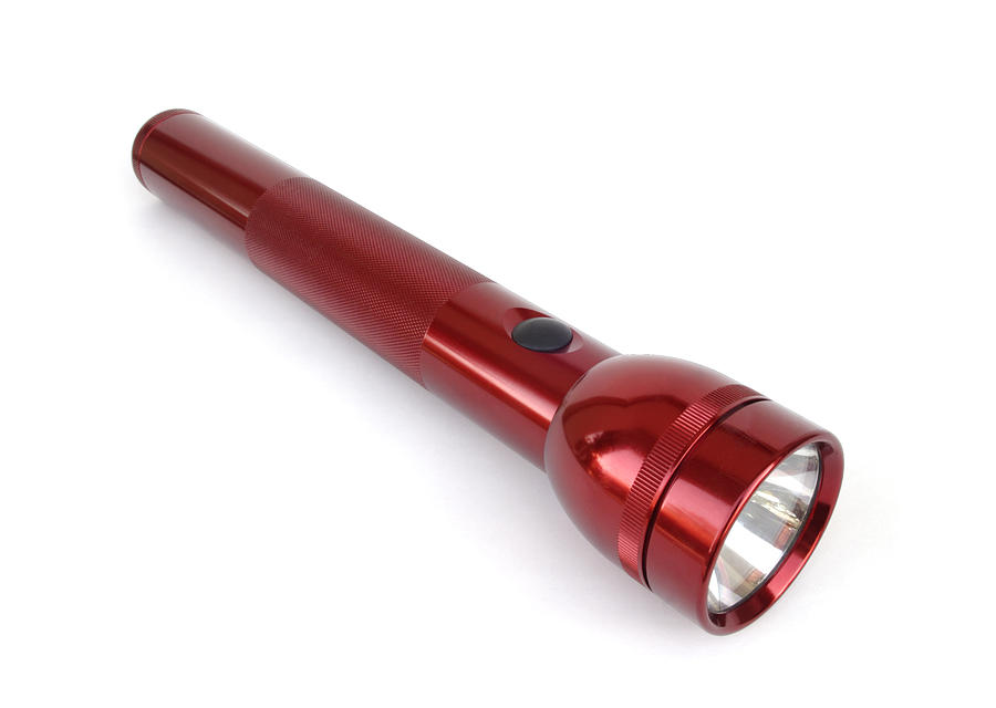 Red Flashlight, isolated on white, clipping path included Photograph by StephanHoerold