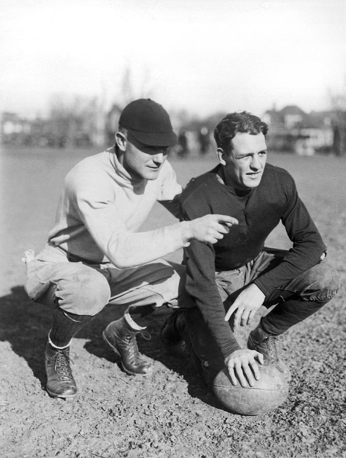 Black And White Photograph - Red Grange And His Coach by Underwood Archives