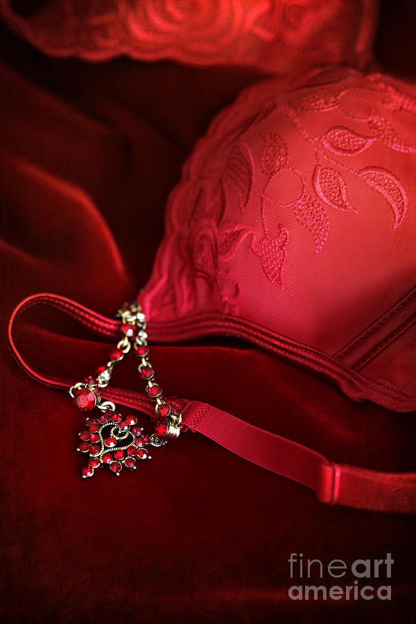 Red lace bra with antique necklace Photograph by Sandra Cunningham