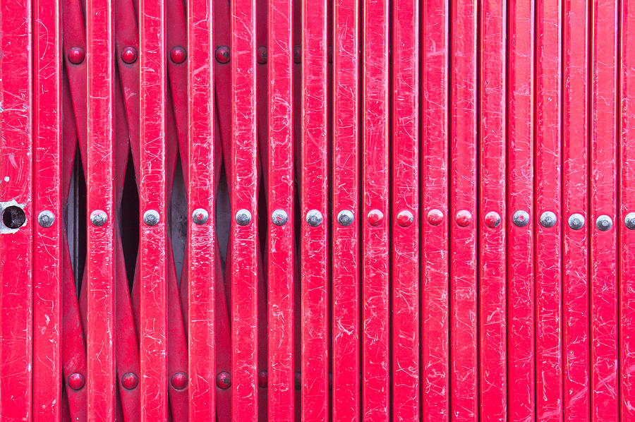 Abstract Photograph - Red metal bars by Tom Gowanlock
