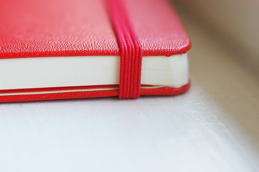 Red moleskine notebook Photograph by Cindy Loughridge
