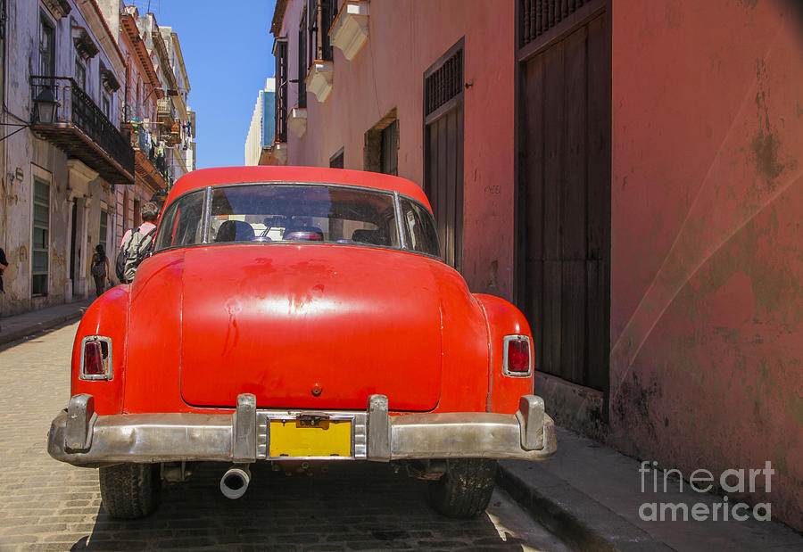 Red oldtimer in Havanna Photograph by Patricia Hofmeester