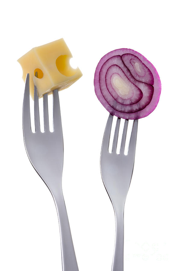 Red Onion And Cheese On Forks Against White Photograph by Lee Avison