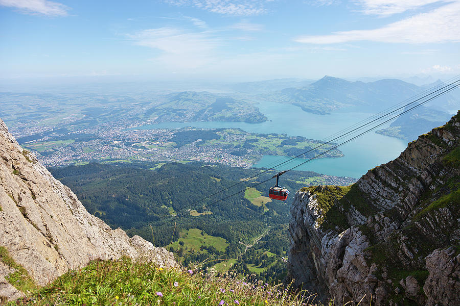 Red Overhead Cable Car In Swiss Alps Photograph by Stockwerk